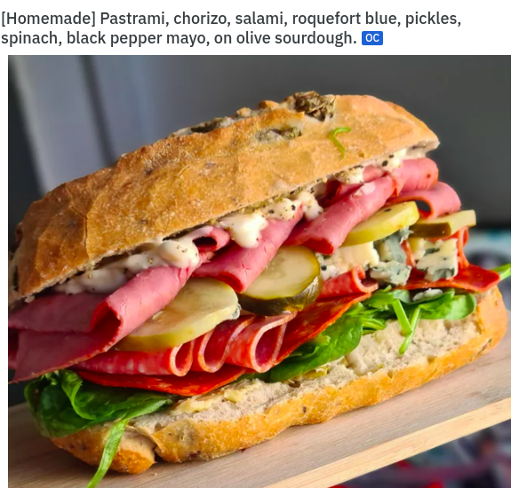 pastrami-chorizo-salami-roquefort-blue-pickles-spinach-black-pepper-mayo-on-olive-sourdough-oc.png